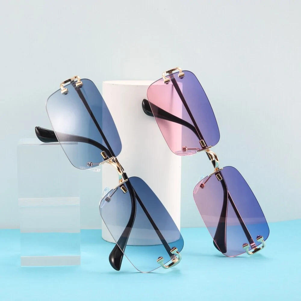 õrae Rectangular Rimless Sunglasses Hõrae Rectangular Rimless Sunglass